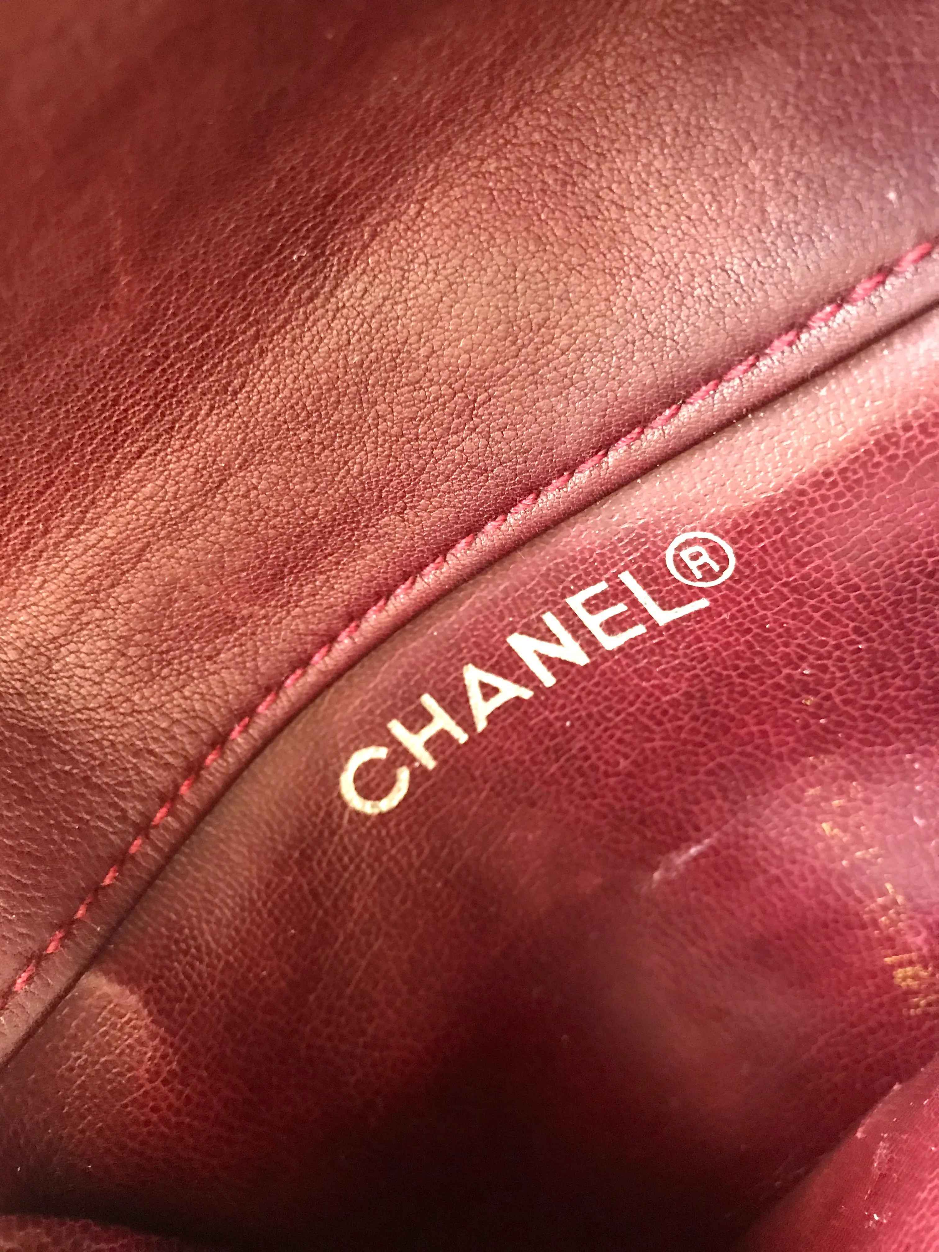 Vintage CHANEL wine fanny pack, leather belt bag with detachable chain belt and CC stitch mark on flap.  Fits 29.5" -32.6"