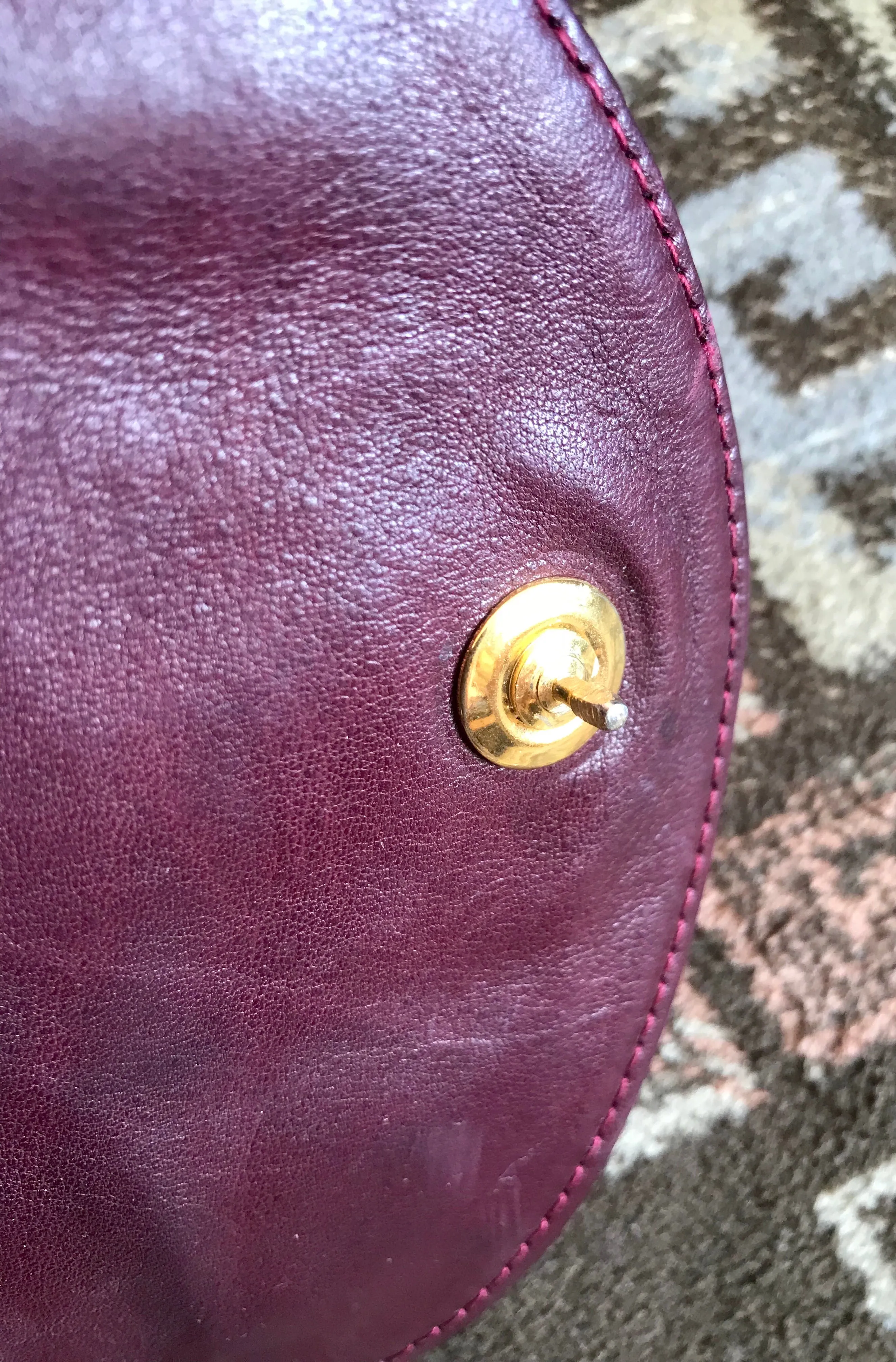 Vintage CHANEL wine fanny pack, leather belt bag with detachable chain belt and CC stitch mark on flap.  Fits 29.5" -32.6"